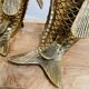 Pair of koi carp vases in brass, animal sculpture