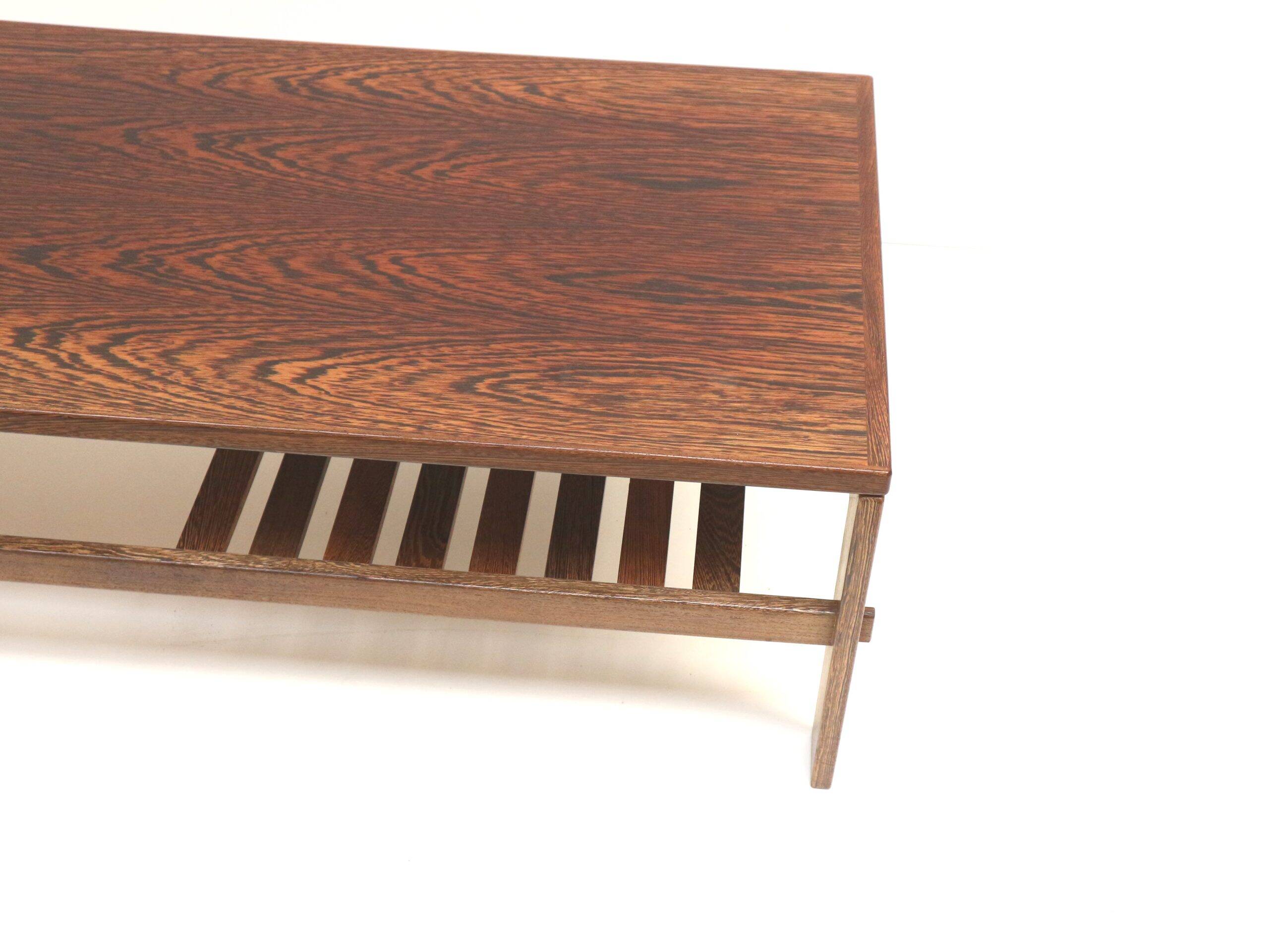 Brutalist wenge coffee table with integrated magazine rack, 1970s