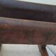Vintage magazine rack in oak and antique leather