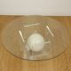 Vintage round coffee table in lucite and marbled glass.