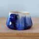 Service of 4 blue ceramic cups and saucers from the 1950s