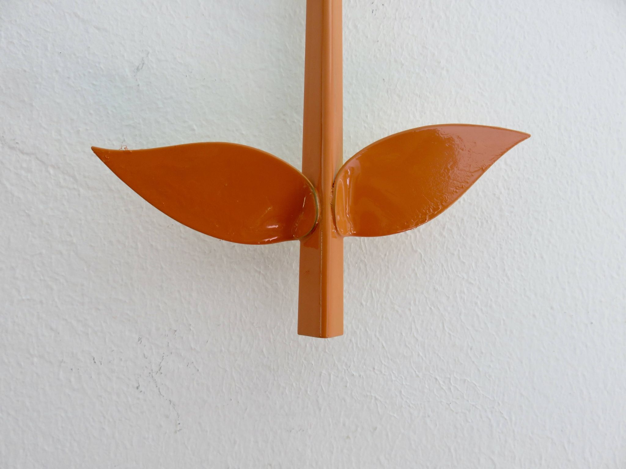 Grand miroir "fleur" 1970 en métal orange