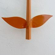 Grand miroir "fleur" 1970 en métal orange
