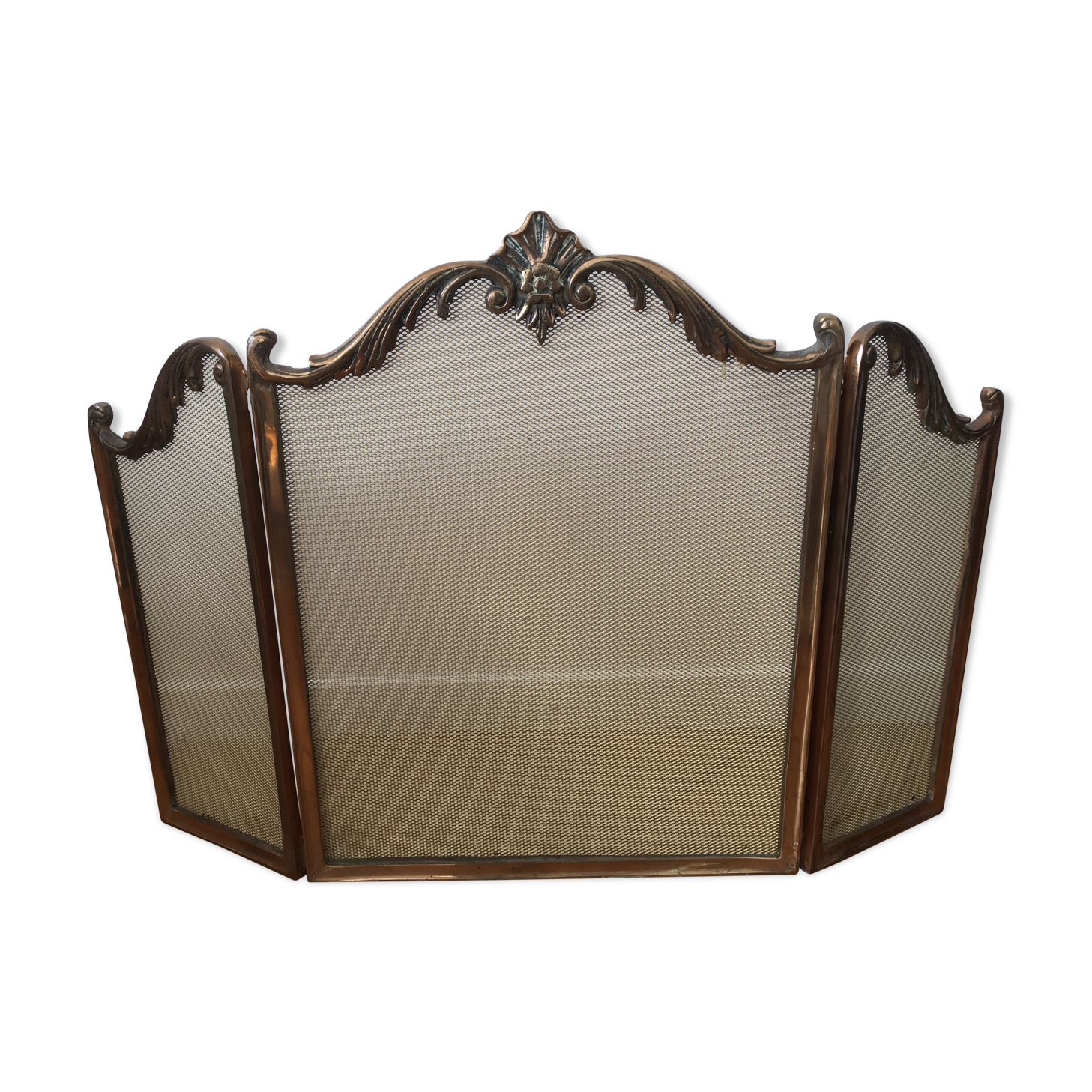 Copper-colored metal fireplace firewall