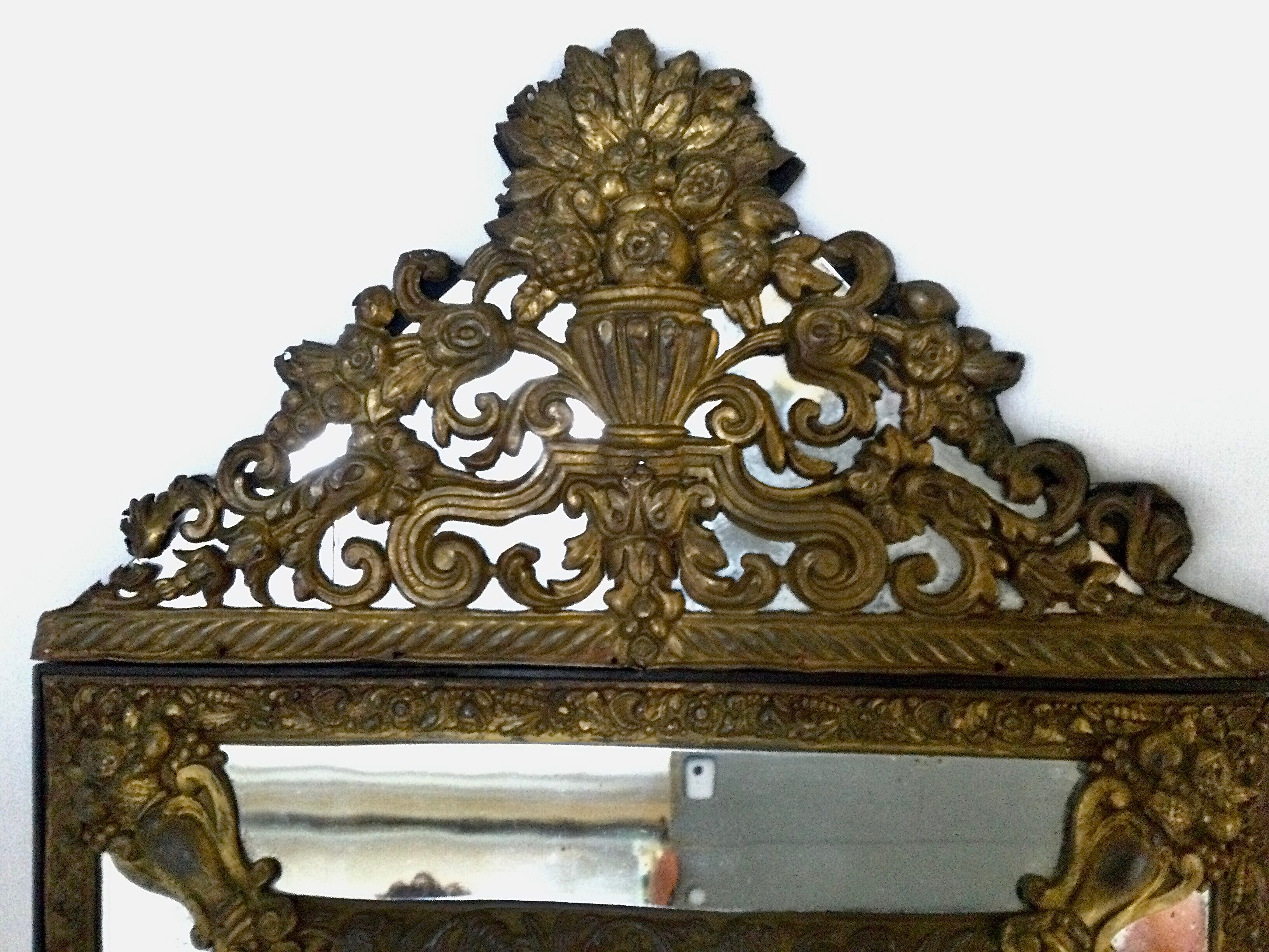 19th century embossed brass mirror with bead - 65x39cm