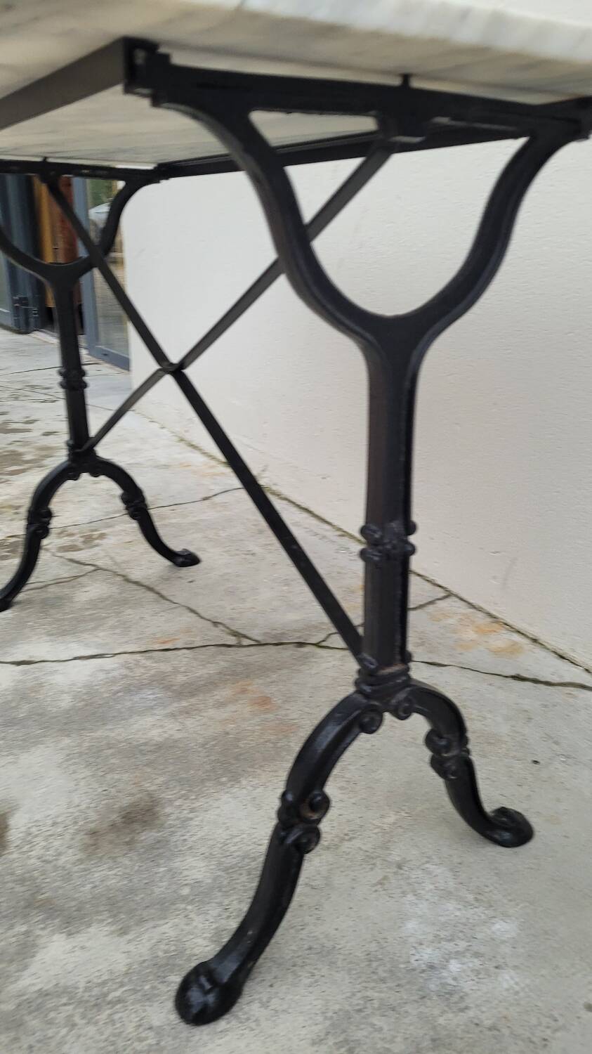 Marble and cast iron restaurant bistro table