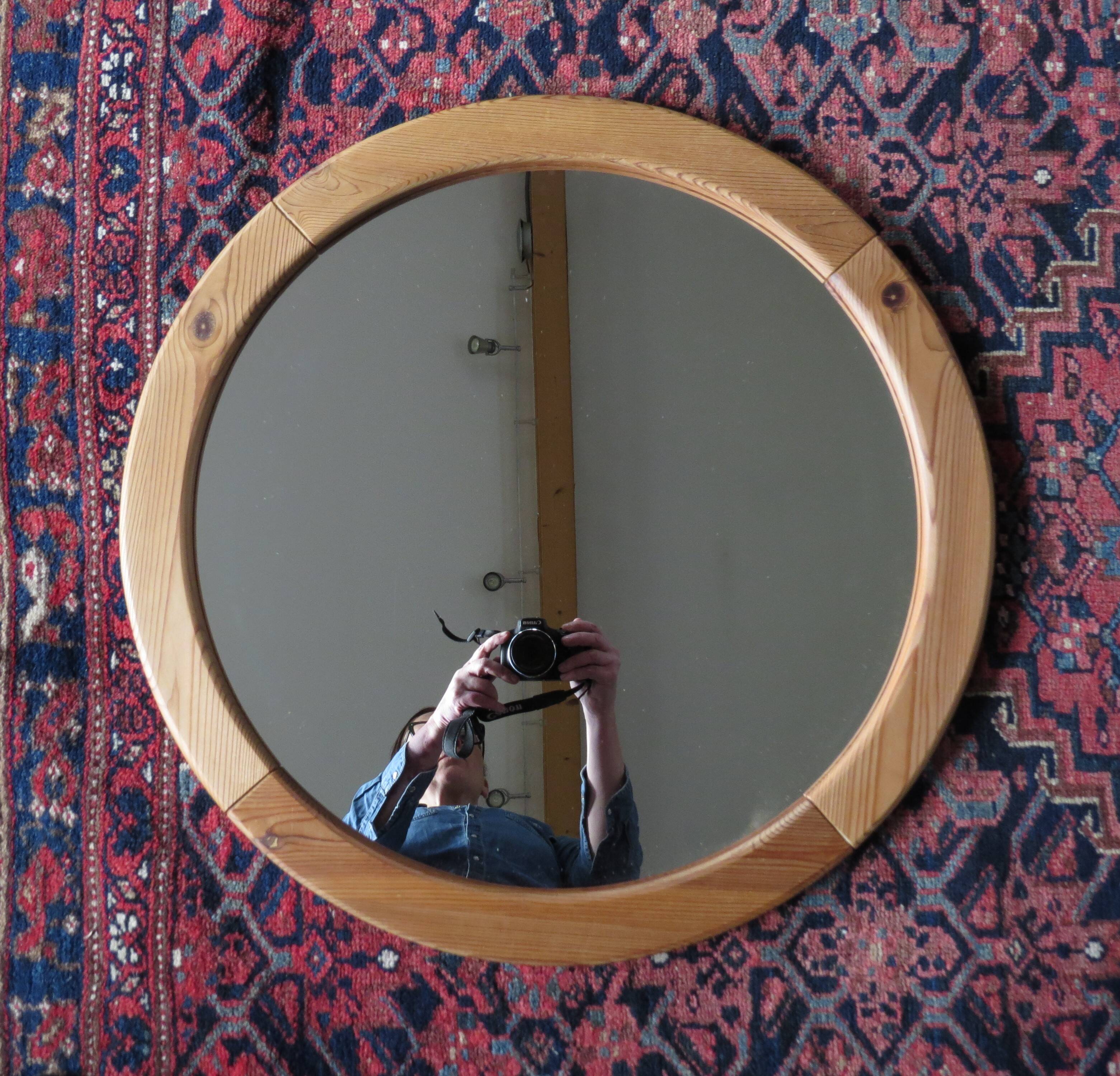 Pair of round Scandinavian pine mirrors from the 70s
