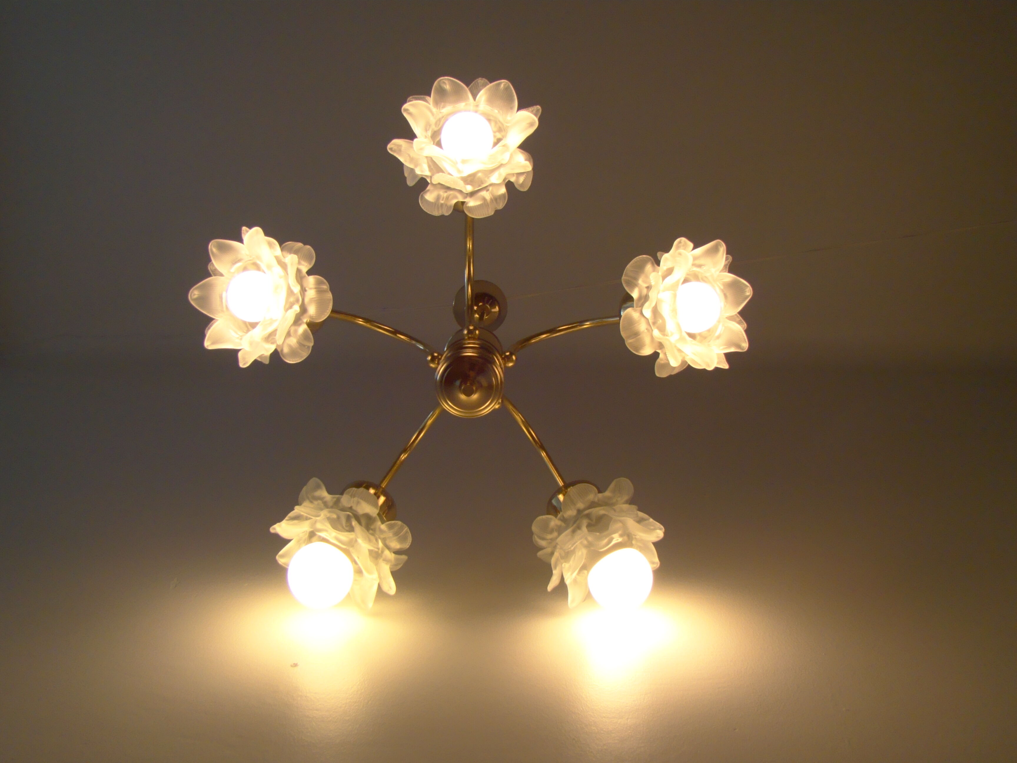 Vintage chandelier with roses in glass paste