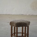 A hexagonal oak stool, seat refurbished in lambswool, Danish design from the 1950s.