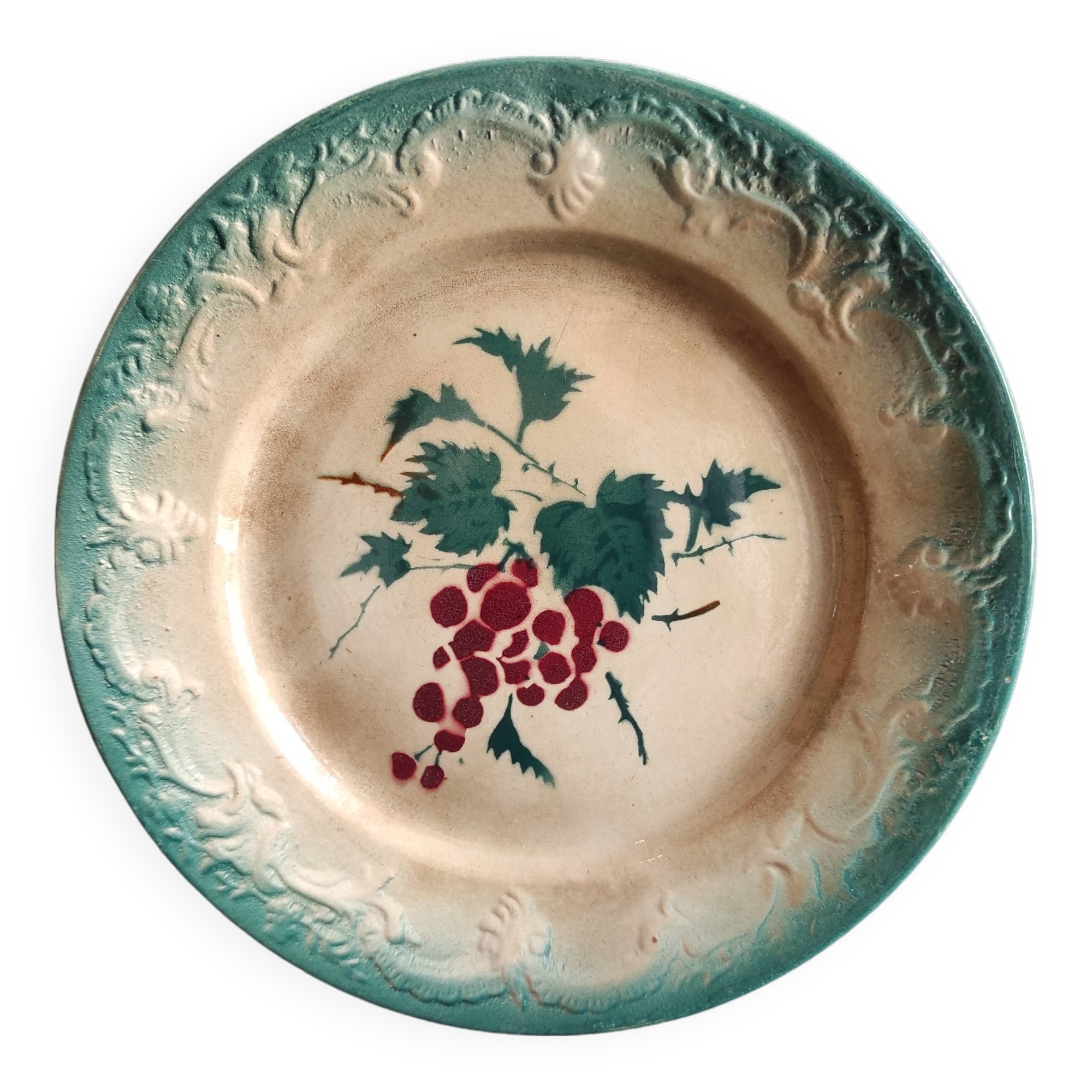 French antique barbotine plate decorated with stencil of grapes, faience de Castres
