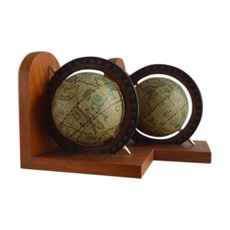Wooden book clamp backs in the shape of planispheres