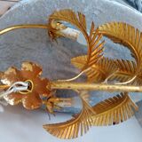 Old wall lamp palm shaped metal dore with leaf