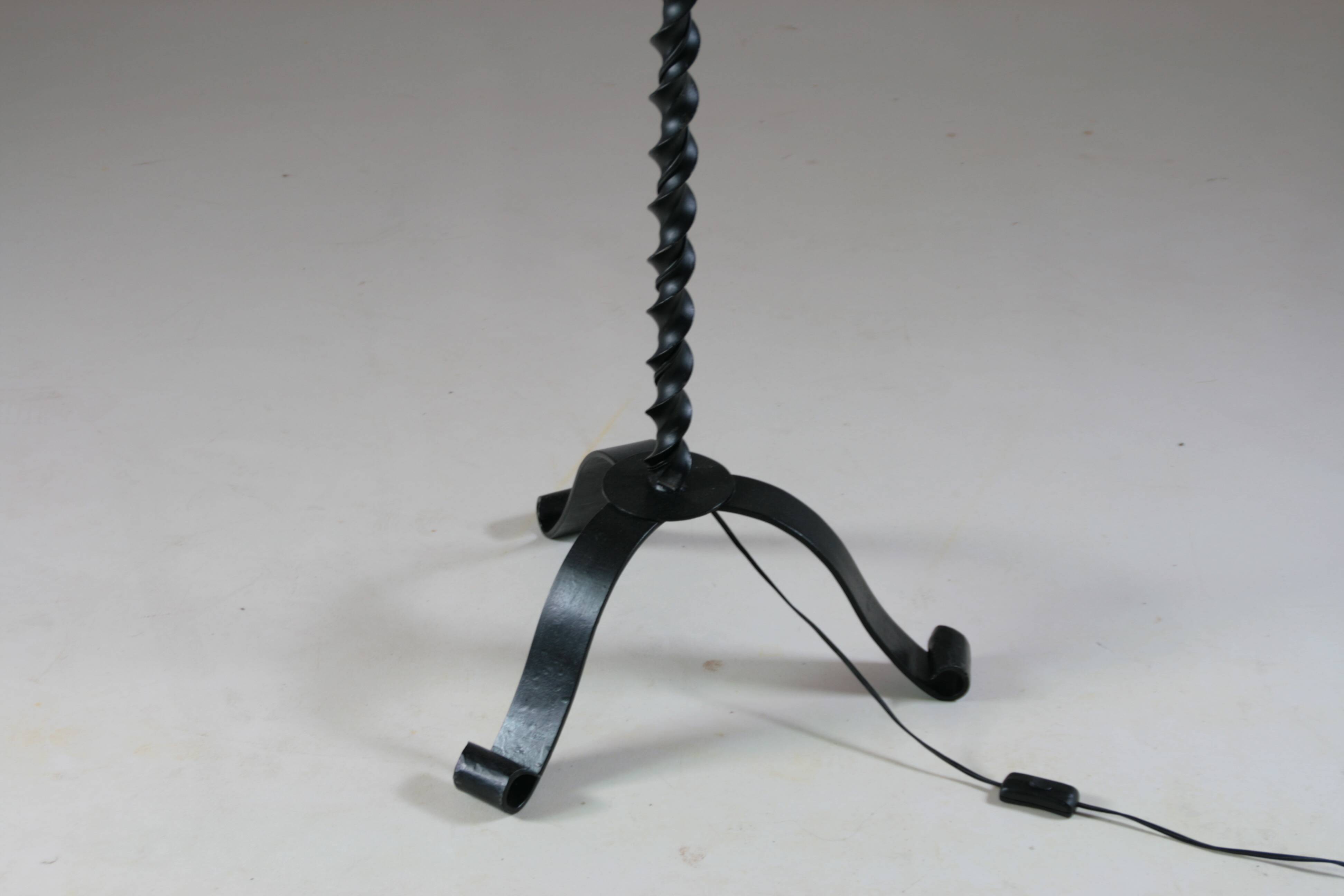 Twisted black metal brutalist floor lamp