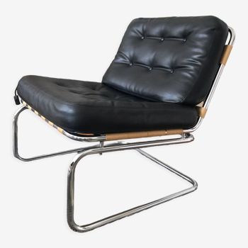 Chrome and leatherette armchair