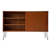 Vintage wooden sideboard with sliding door