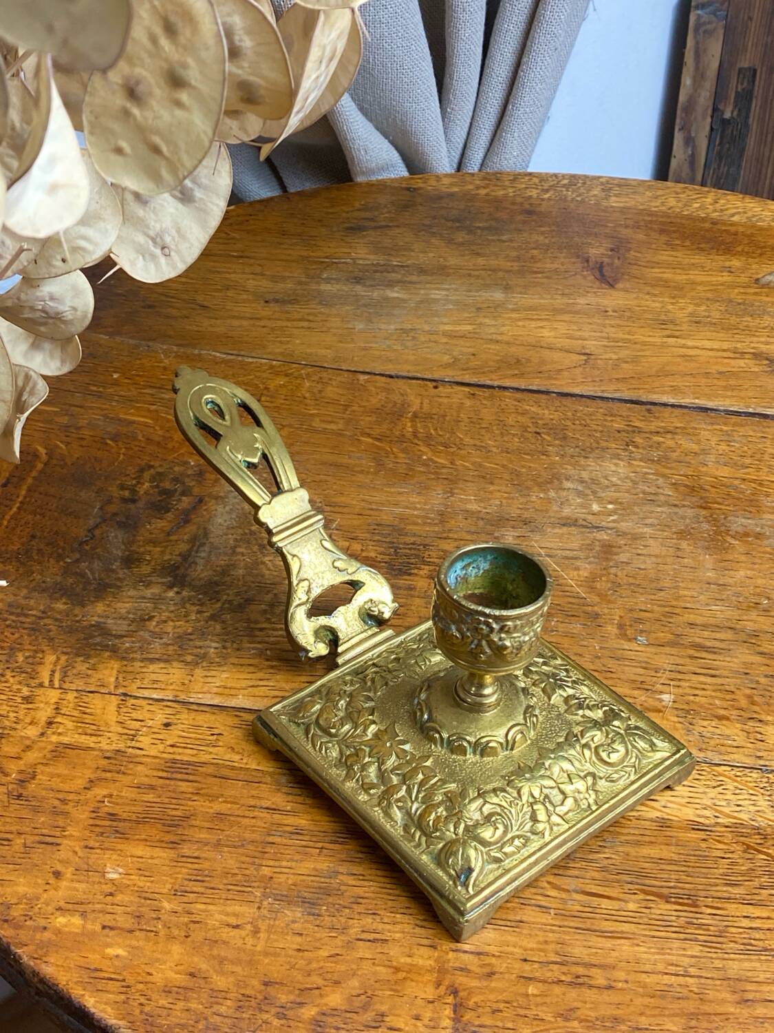 Bronze hand candlestick