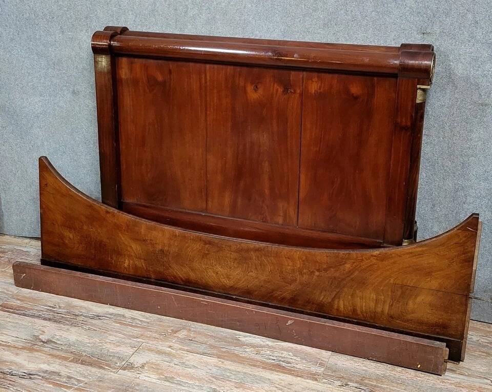 Rare Empire period mahogany bed with gilt bronze profiles circa 1800