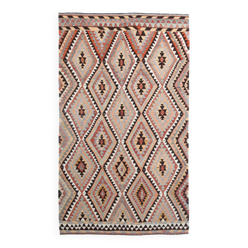 Grand kilim vintage motifs géométriques, tons terre et bleu pastel