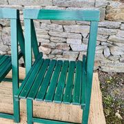 Set of 4 green folding chairs