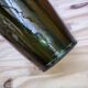 Vase en céramique à coulure dans le gout de jerome massier ou travail belge à anses en bronze