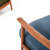 Pair of mid century Danish reclining lounge chairs in teak