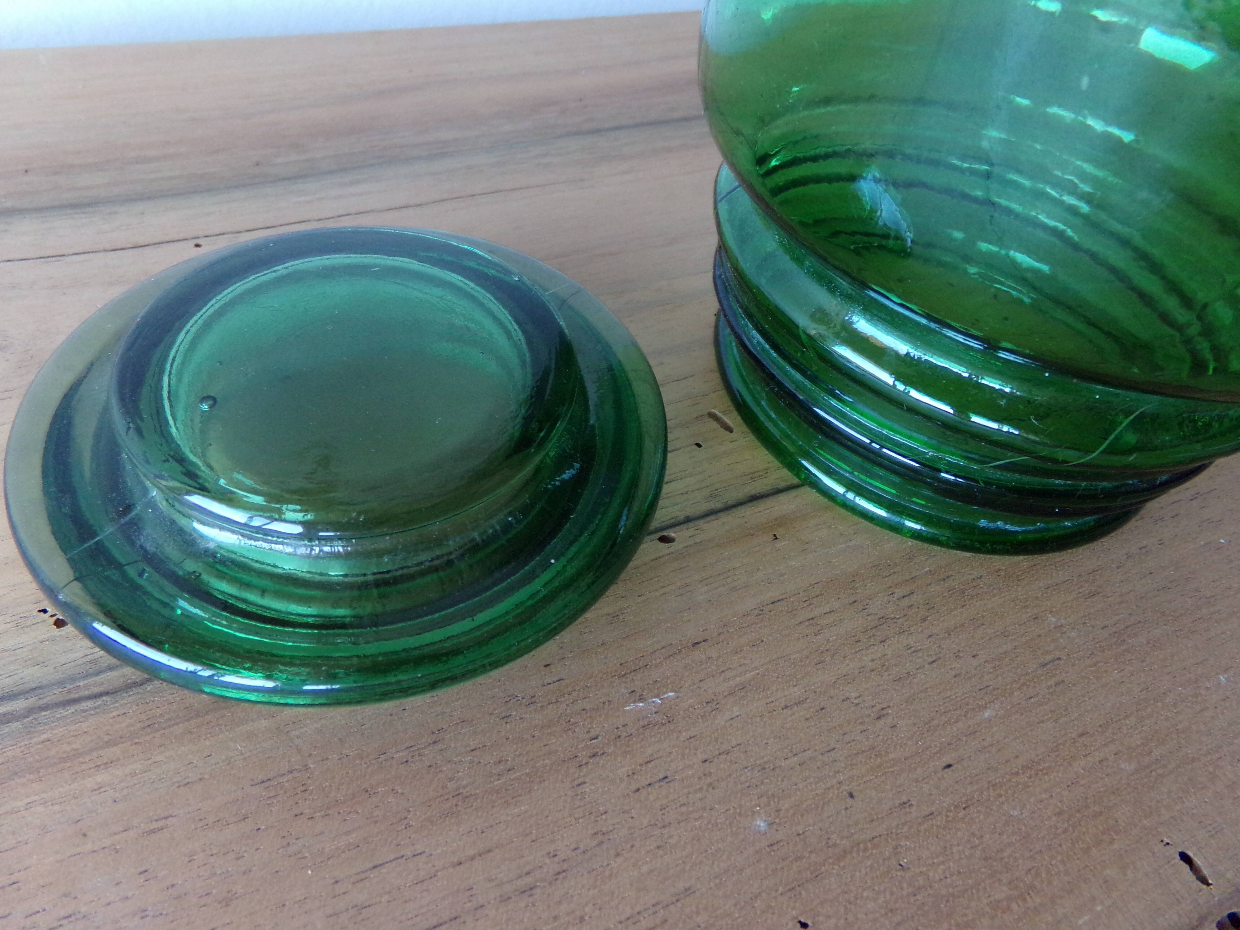 Antique green glass jar