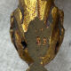 Bronze wall light, decorated with a bow and ribbon.
