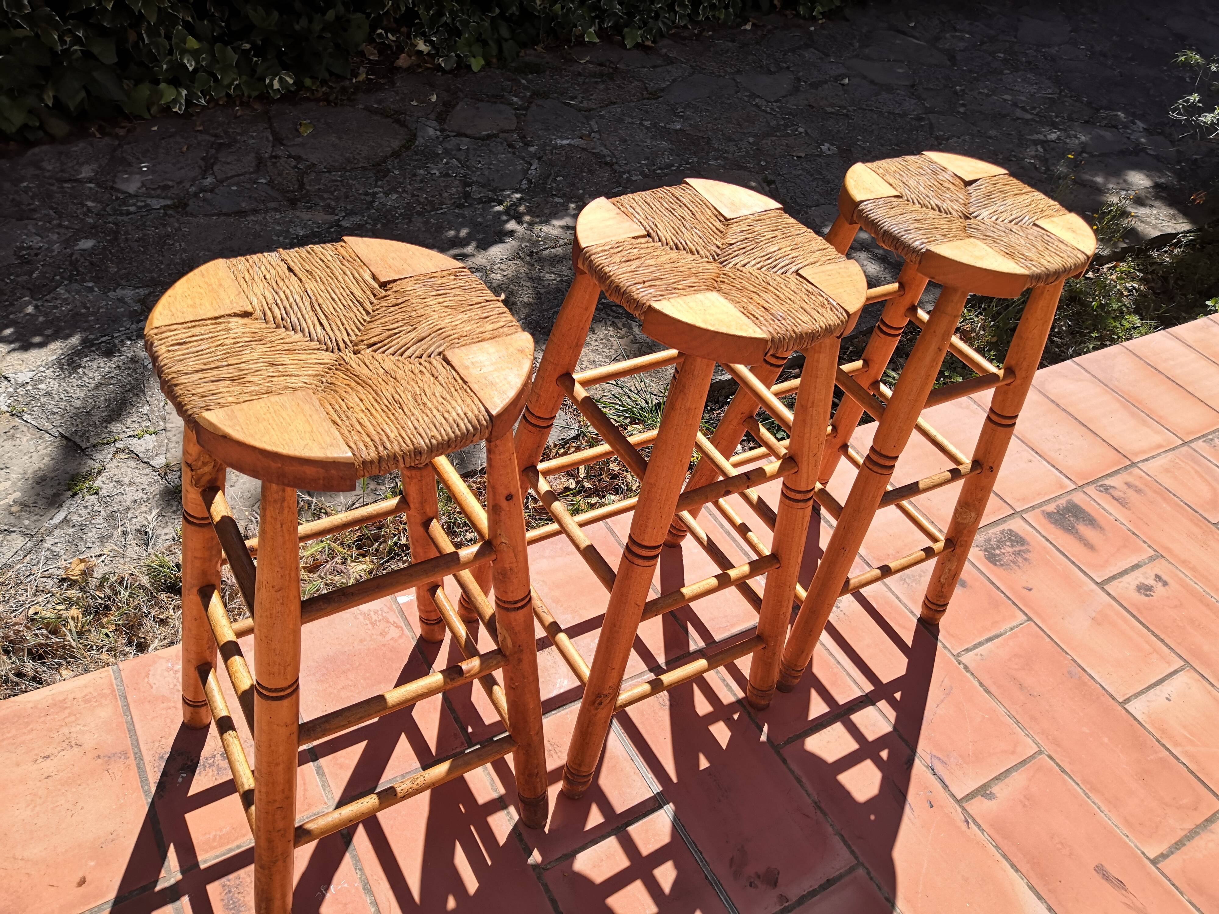 Set of 3 high “modernist” straw stools vintage 1950s