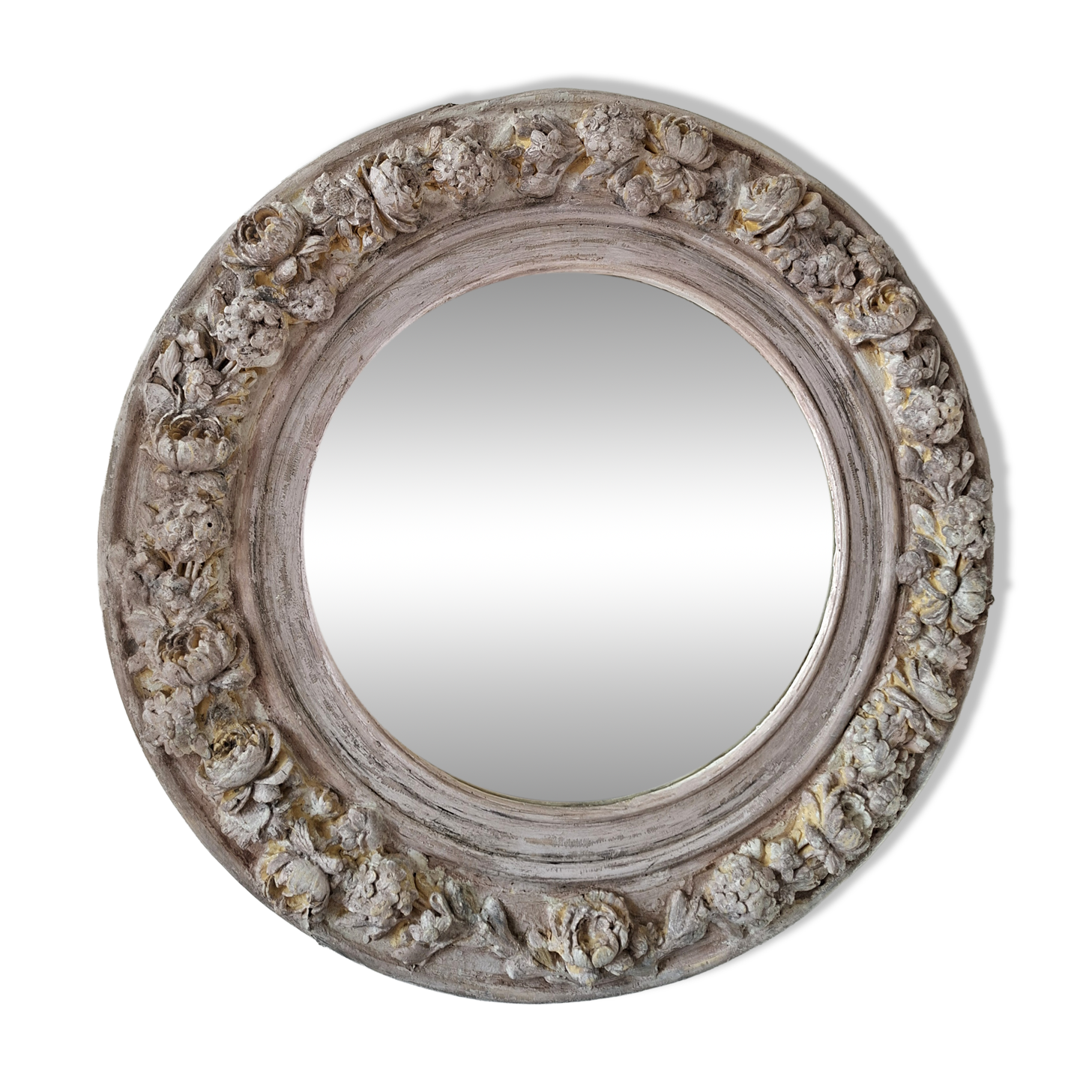 Round mirror with floral patterns