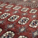 Handwoven red Boukhara oriental rug, 1960s