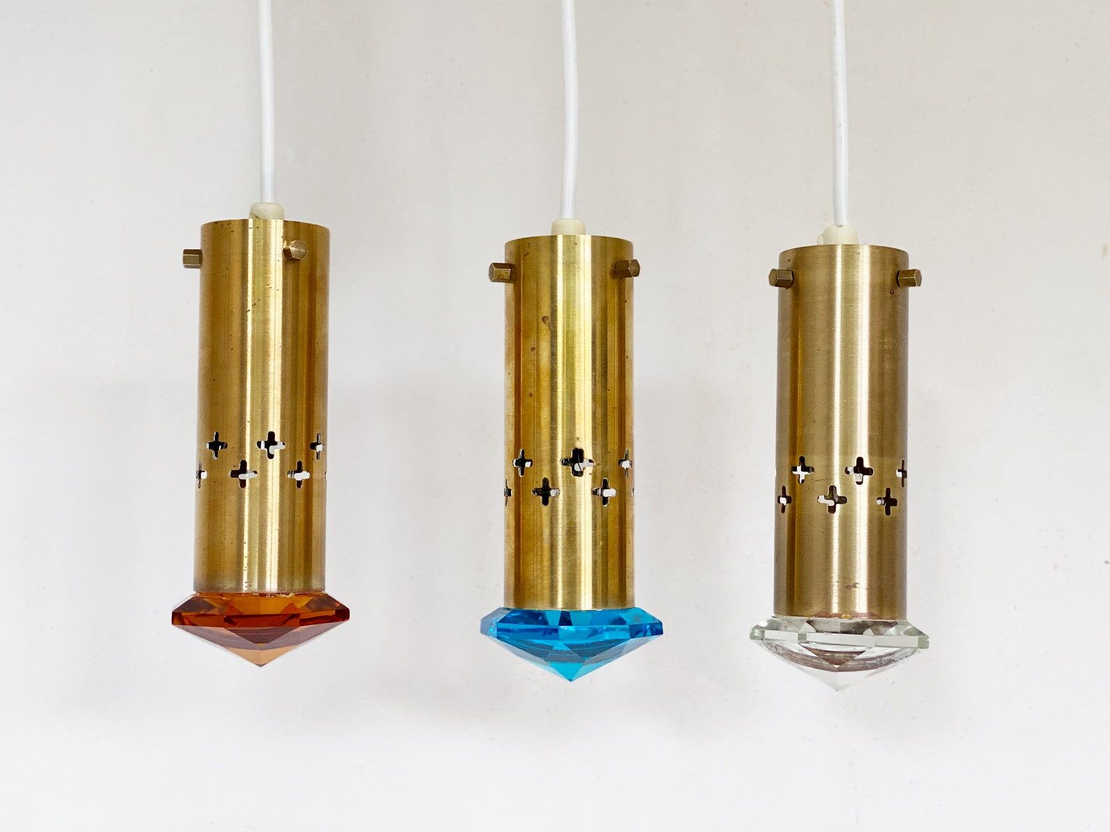 3 Mid Century Helmer Andersson for Örsjö hanging lamps, Brass and colored glass