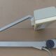 WALDMANN articulated workshop lamp with two industrial clamp arms for architects.