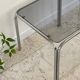 Table basse annees 70 verre et acier chromé