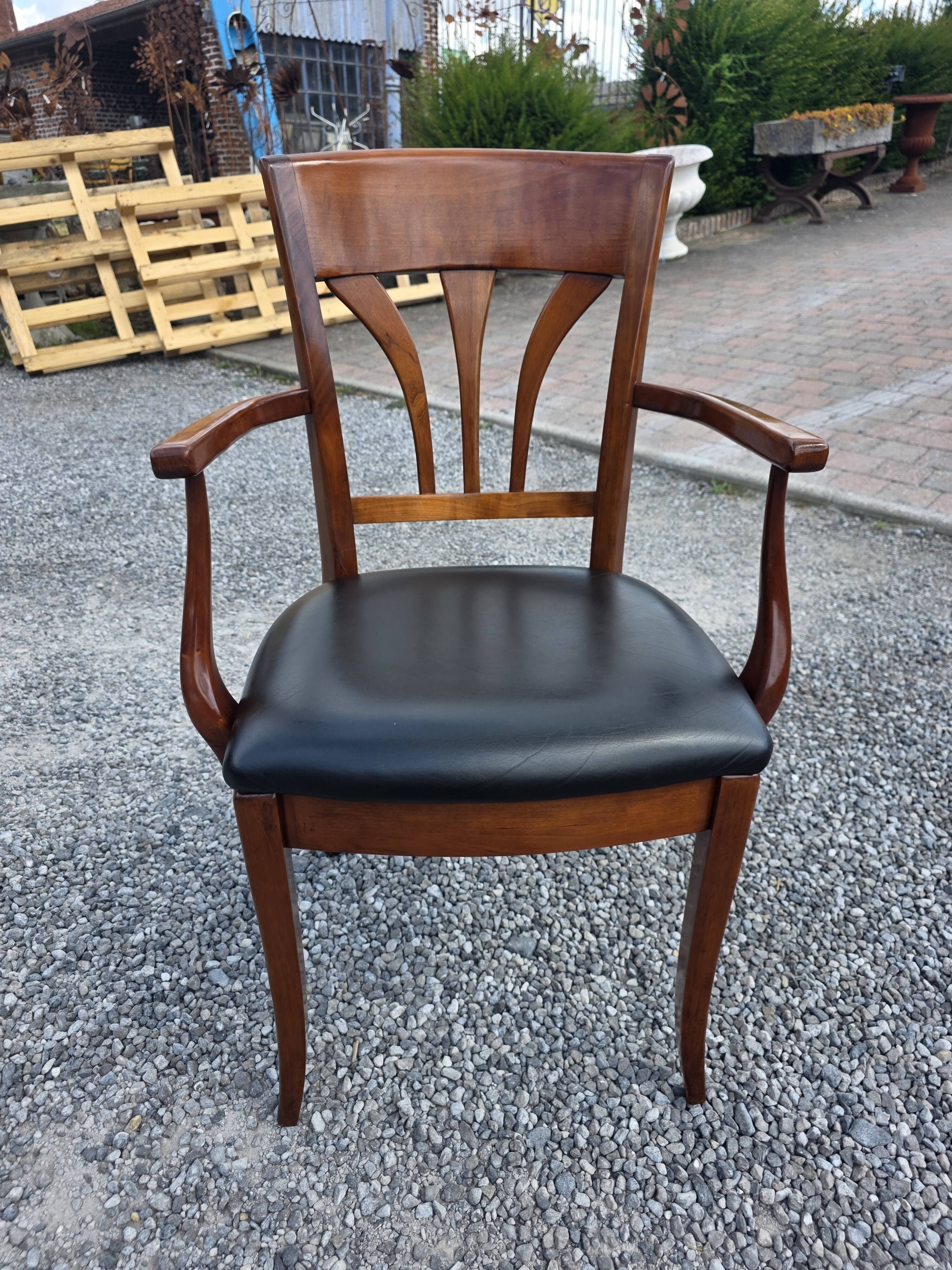 Mid-20th century solid cherry wood office chair.