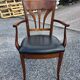 Mid-20th century solid cherry wood office chair.