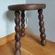 Tripod stool in wood turned coil way