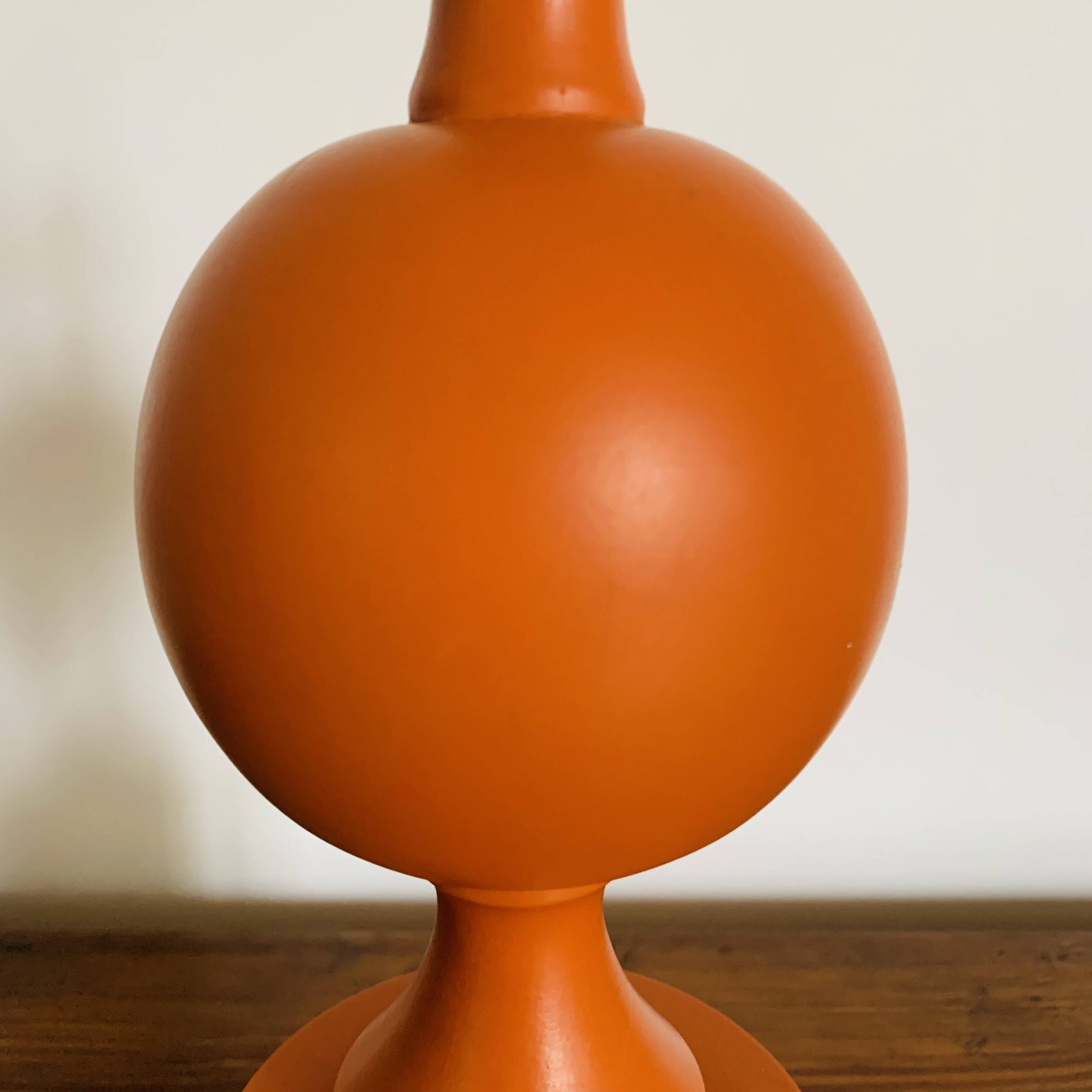 Orange turned wooden lamp base