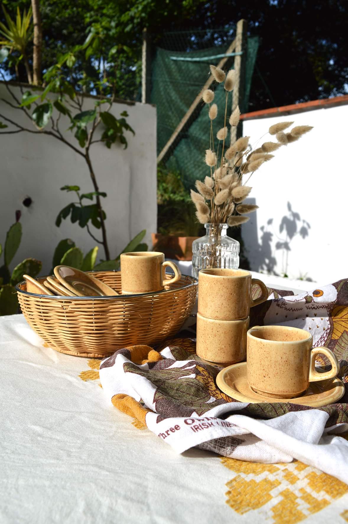 Series of 6 sandstone cups and saucers