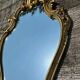 Miroir de style Louis XV en composite doré vintage 70'S 42x68cm