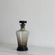 Carafe, old smoked glass bottle with sculpted stopper.