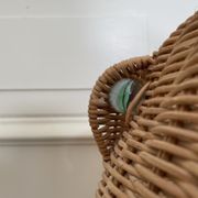 Wicker frog magazine holder by Olivier Cajan