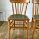 Pair of bistro chairs in light curved wood and green seat 1950s