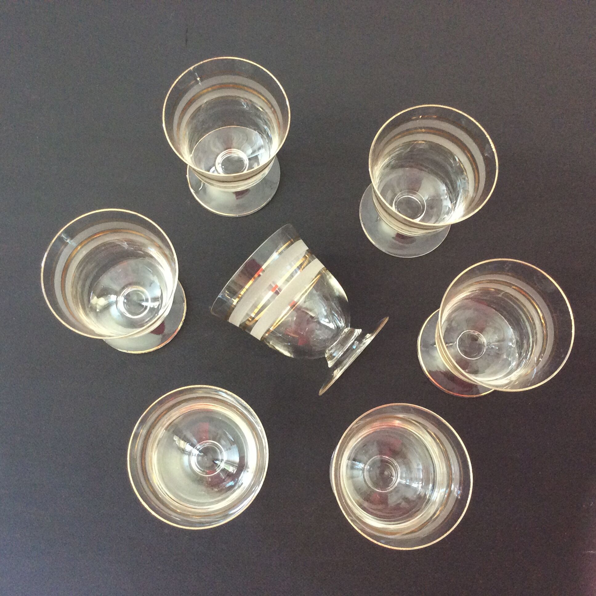 Fine glasses on pedestal with gold border - vintage