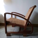 Pair of Art Deco woven rattan armchairs and table