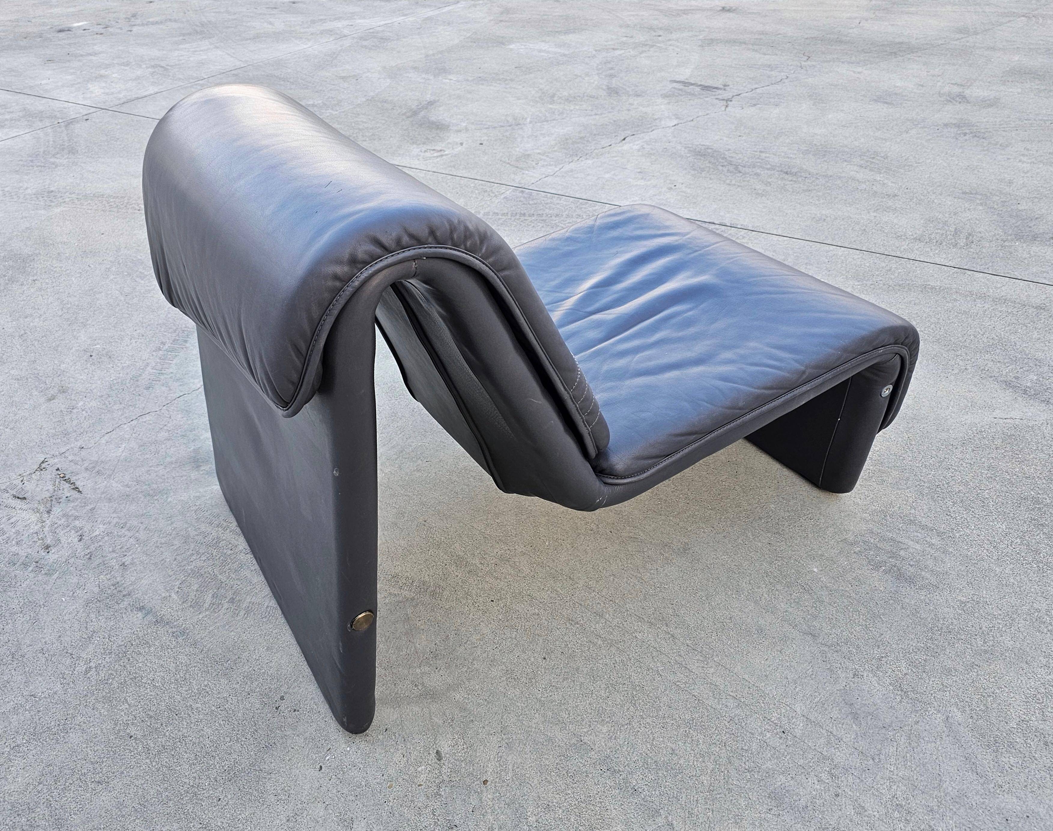 Postmodern leather lounge chairs in the style of Etienne Fermigier 1978.