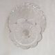 Old cup in molded glass colorless decorative table mignardises
