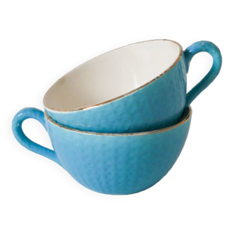 Pair of digoin sarreguemines cups textured sky blue and gold edging 1950