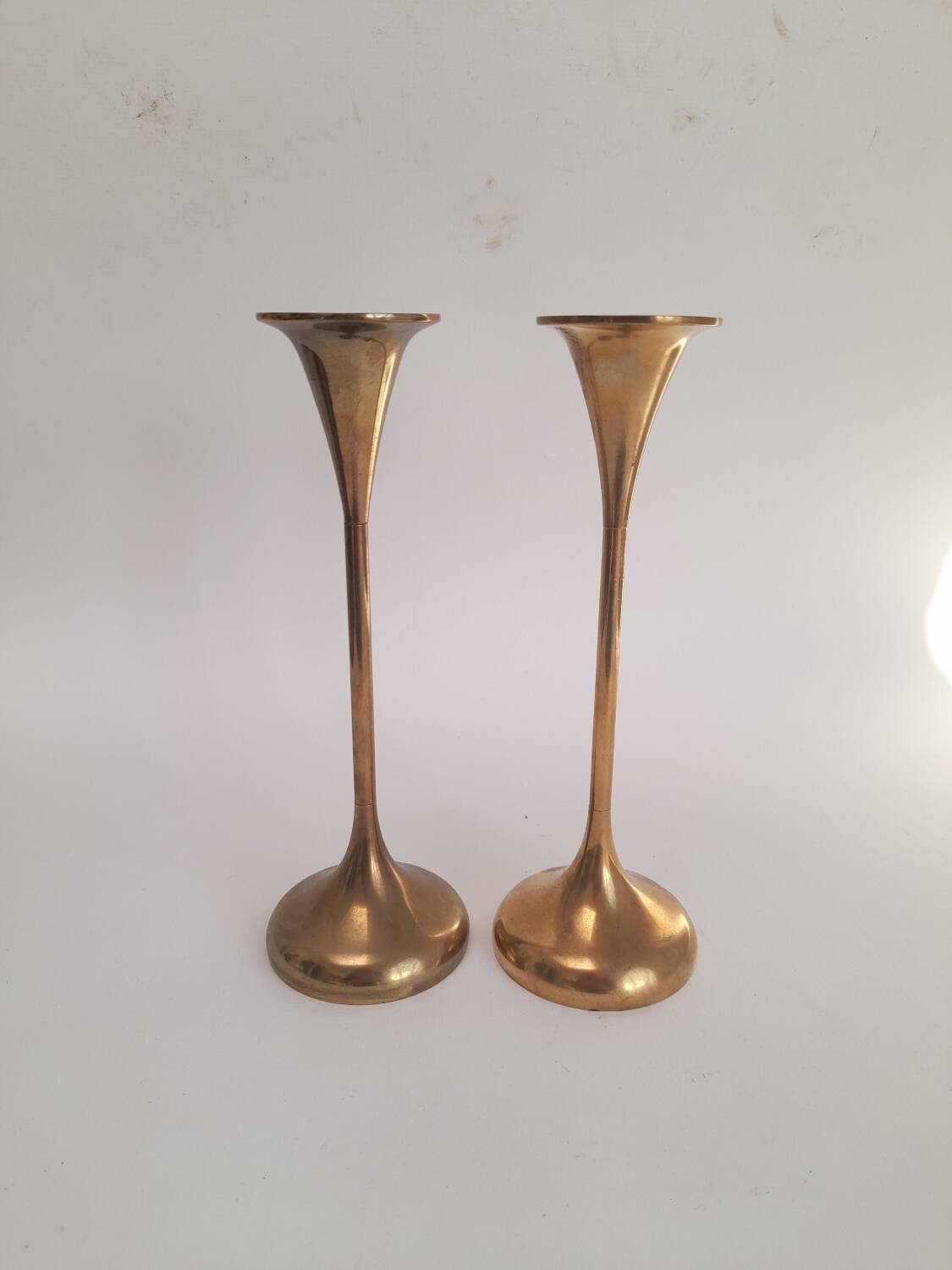 Pair of trumpet candlesticks in brass, Danish design.
