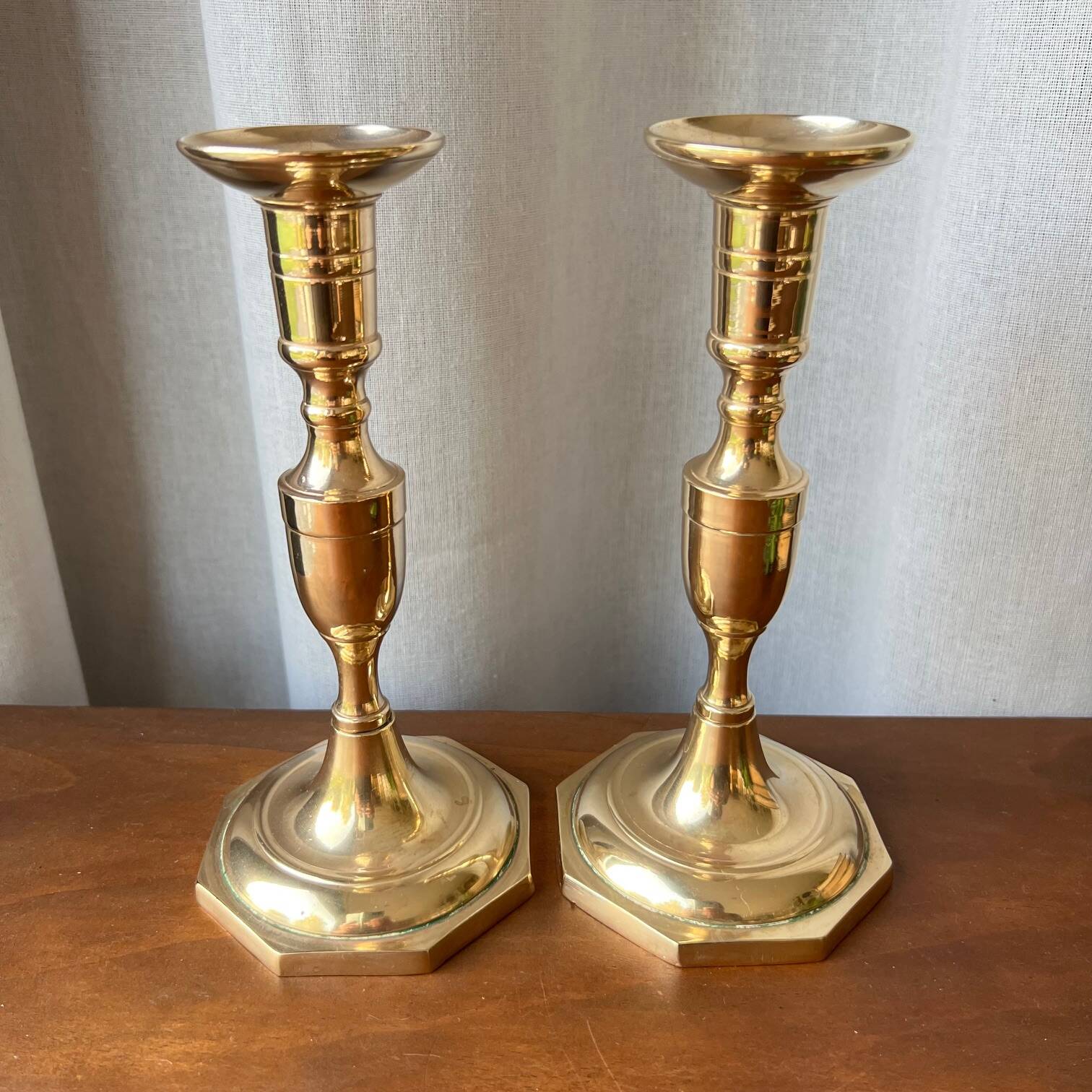 Duo of brass candlesticks