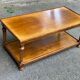 Extendable coffee table in solid wood with two shelves, 100 cm